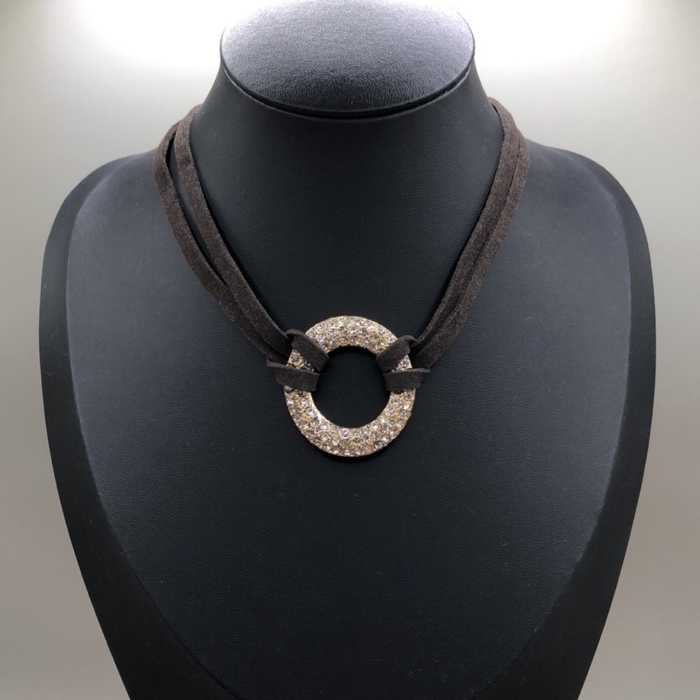 Jules sude like corded dazzling rhinestone circular choker necklace.